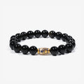 Studio product shot of Golden Enameled Obsidian Bracelet isolated on a clean white background.