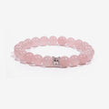 Studio product shot of Serenity Heart Rose Quartz Bracelet isolated on a clean white background.