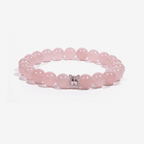 Studio product shot of Serenity Heart Rose Quartz Bracelet isolated on a clean white background.
