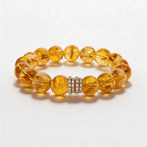 Studio product shot of Brazilian Citrine Bracelet with a customizable centerpiece isolated on white.