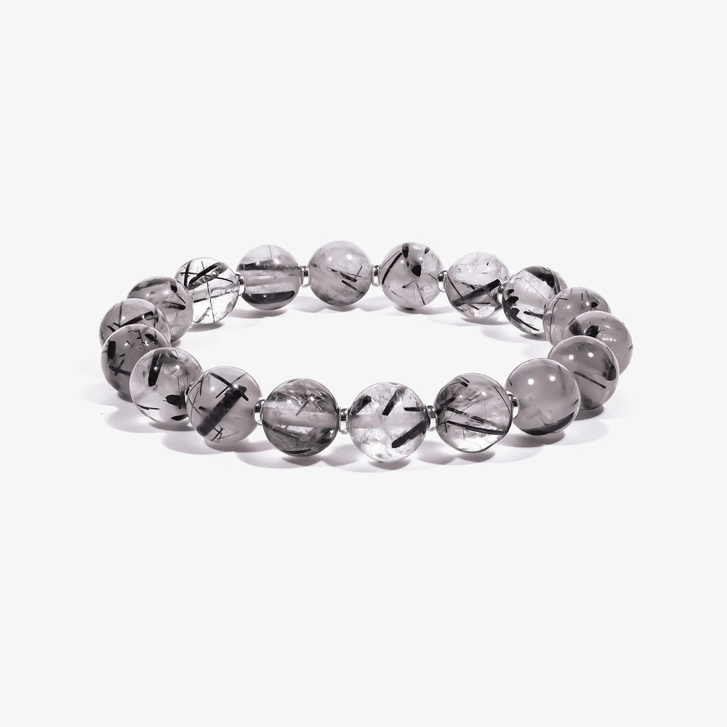 Studio product shot of Calm Armor Black Rutilated Quartz Bracelet isolated on a clean white background.
