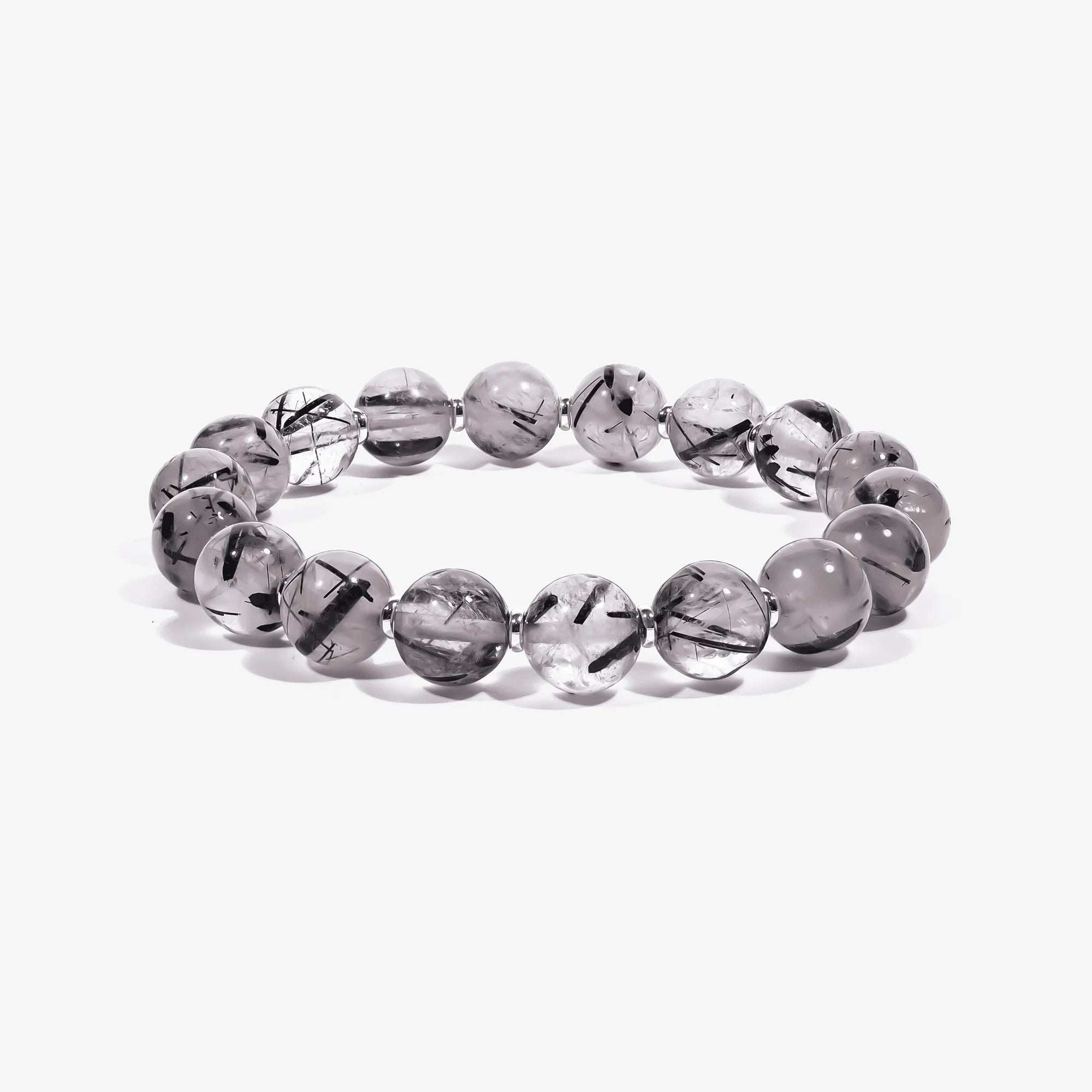Studio product shot of Calm Armor Black Rutilated Quartz Bracelet isolated on a clean white background.