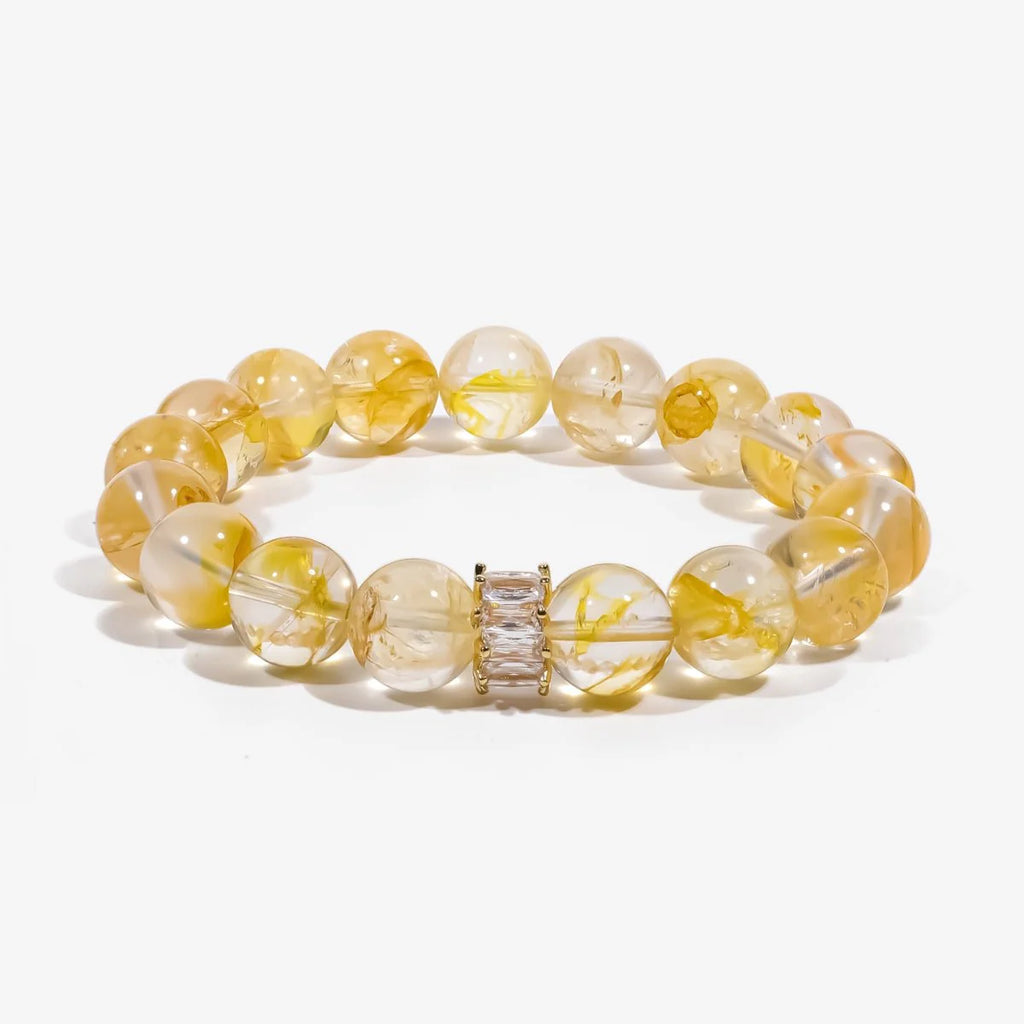 Studio product shot of Golden Healer Yellow Quartz Bracelet isolated on a clean white background.