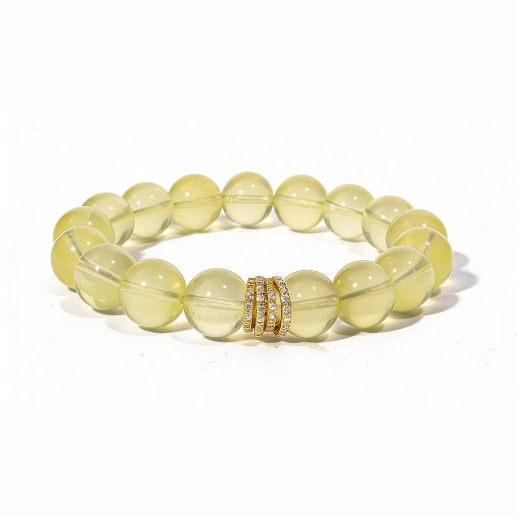 Studio product shot of Golden Radiance Lemon Quartz Bracelet isolated on a clean white background.