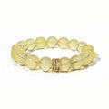 Studio product shot of Golden Radiance Lemon Quartz Bracelet isolated on a clean white background.